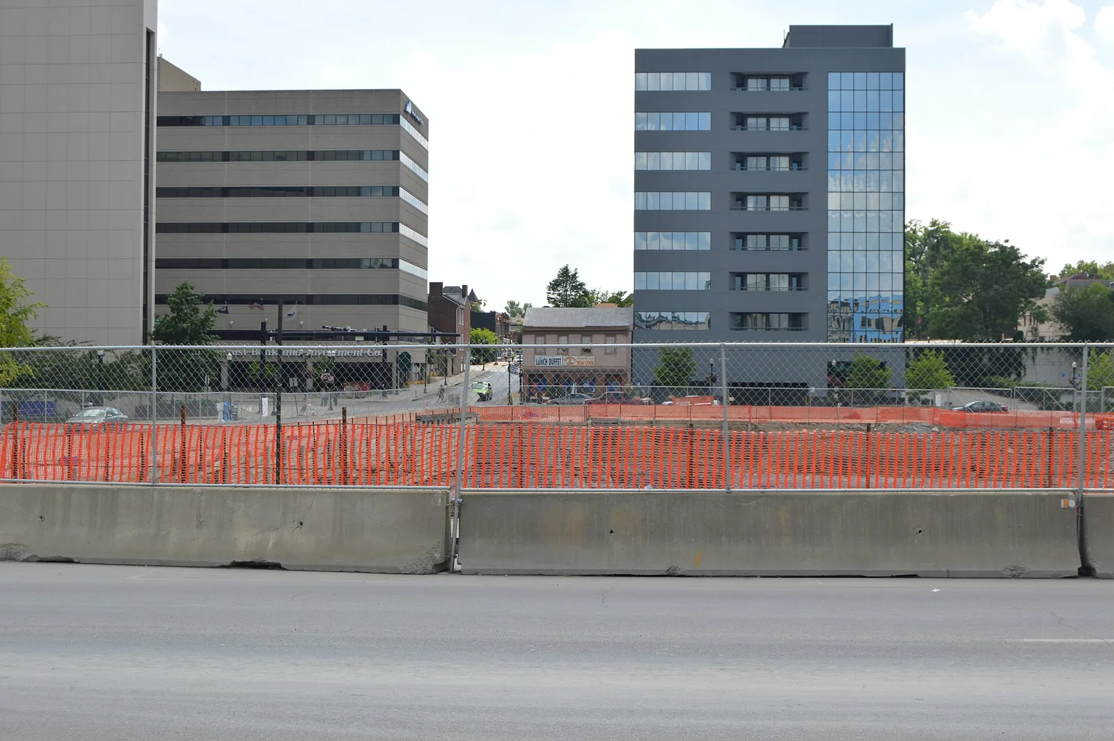 A fenced construction site on the former F.W. Woolworth Building lot in downtown Lexington
