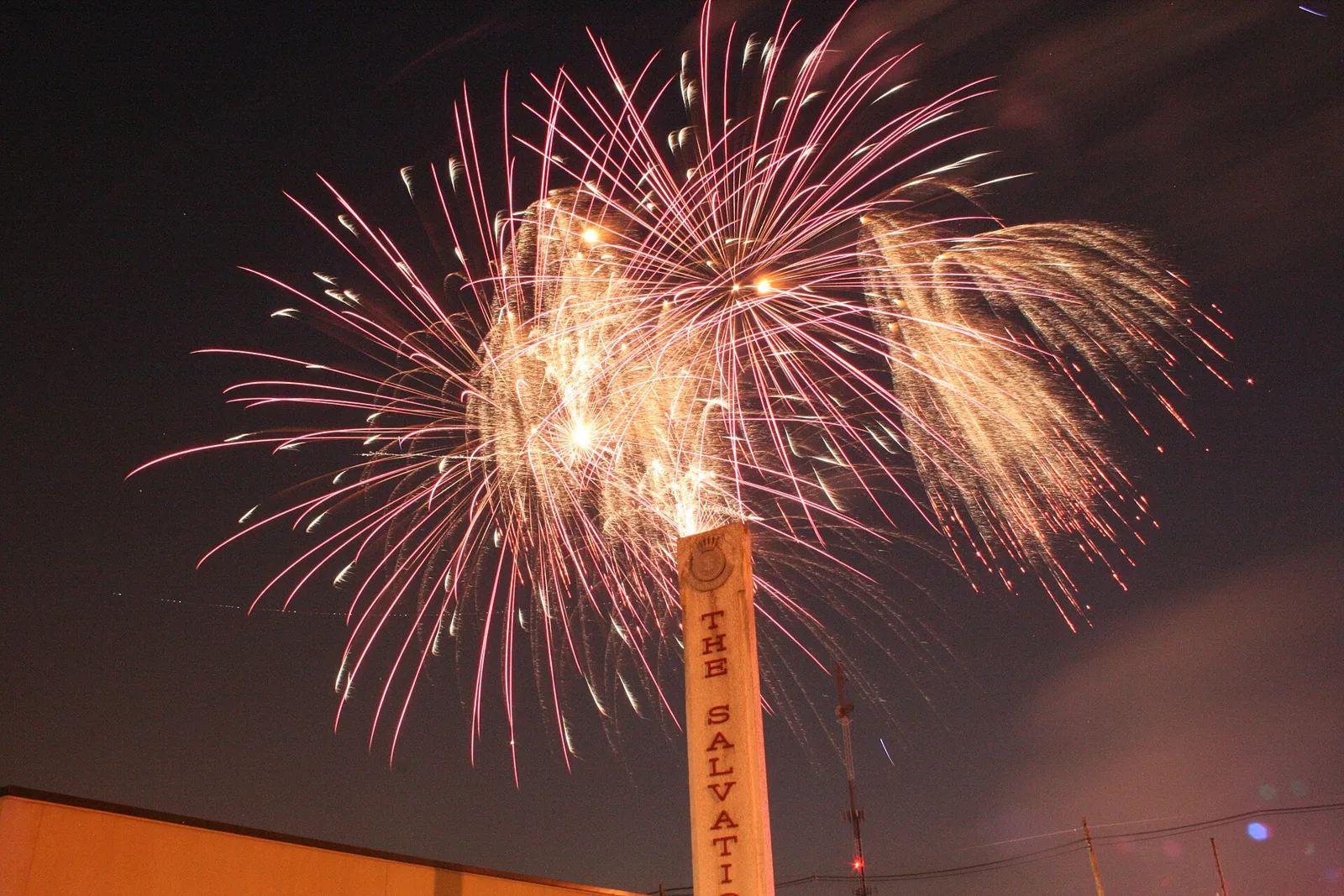 Fourth of July fireworks burst above a Salvation Army building in Lexington