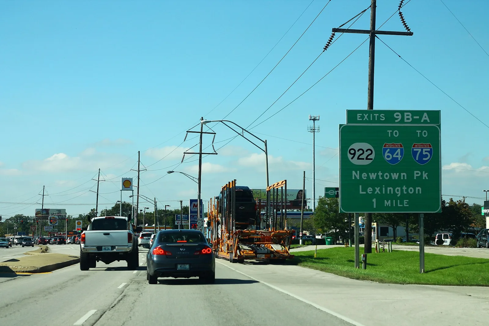 A sign on westbound New Circle Road (KY 4) for Exits 9B-A to Newtown Pike and I-64 and I-75 in Lexington