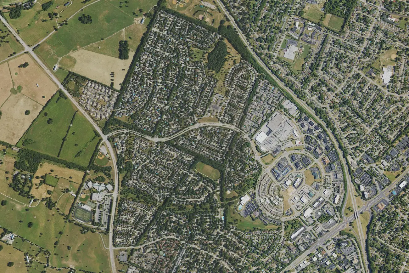 Aerial view of homes, streets and the Beaumont Centre area in southwest Lexington