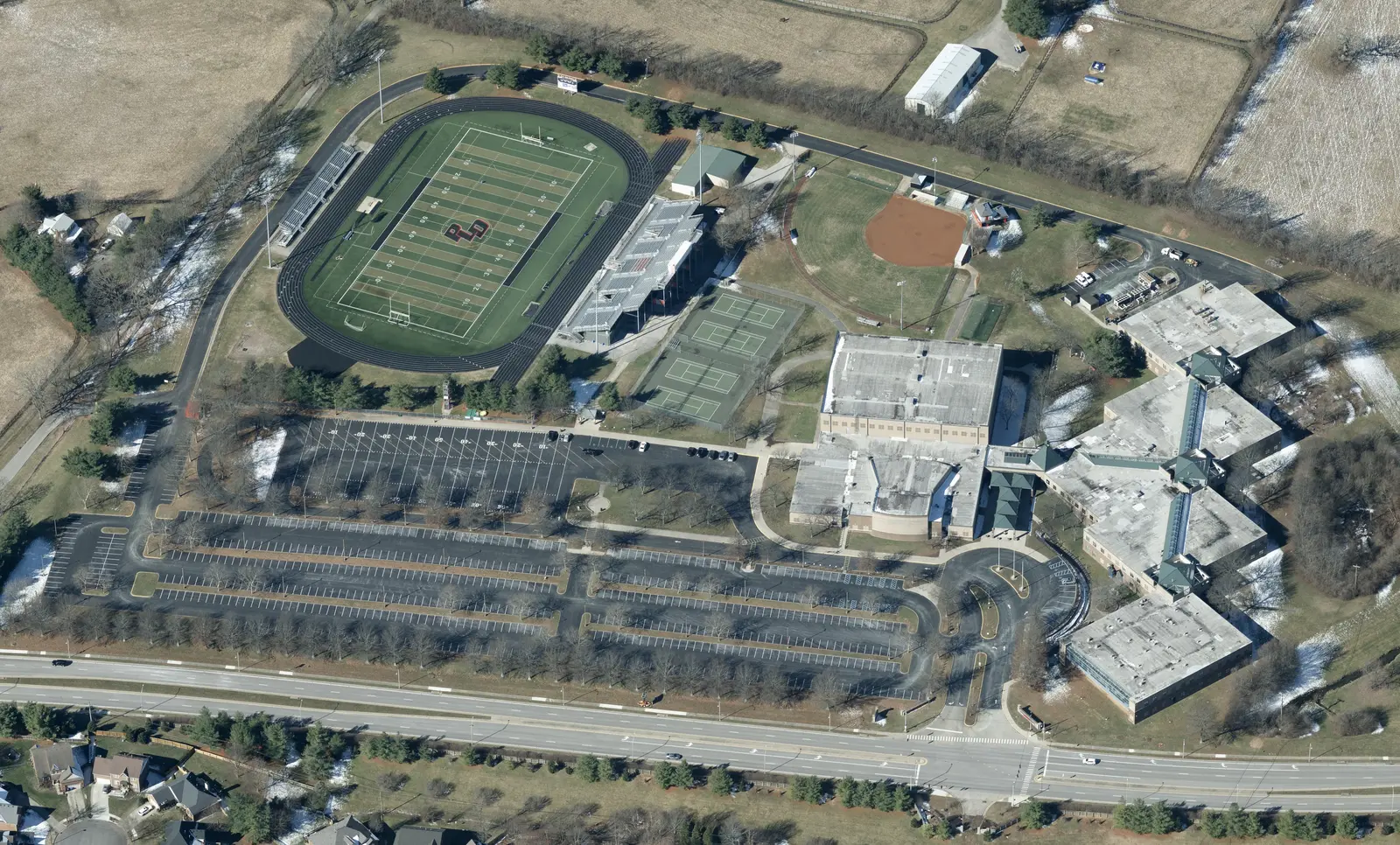 Paul Laurence Dunbar High School, its stadium and parking lots on Man o' War Boulevard in Lexington, seen from the air