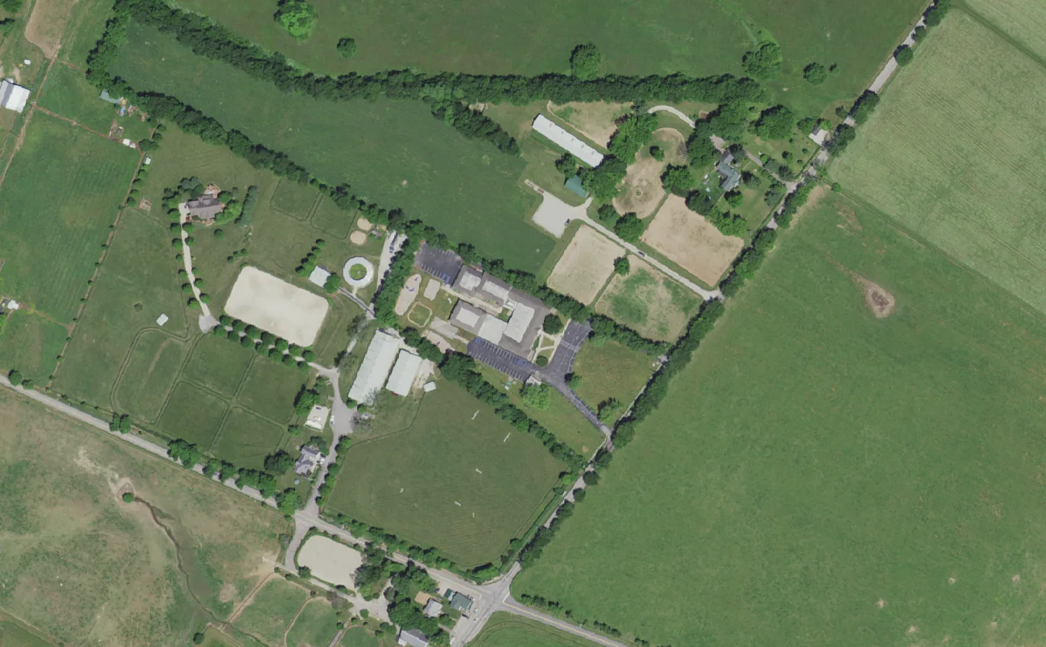 Russell Cave Elementary School and its grounds on Russell Cave Road in Lexington, seen from the air